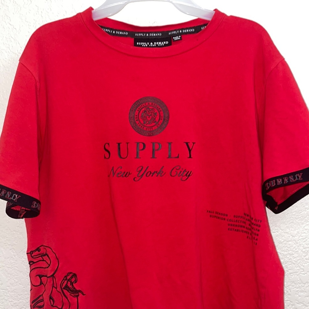 Supply and Demand clothing brand tee shirt.
